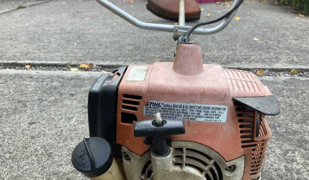 Stihl FS 200 engine housing label confirming 36.3cc displacement and professional model series.