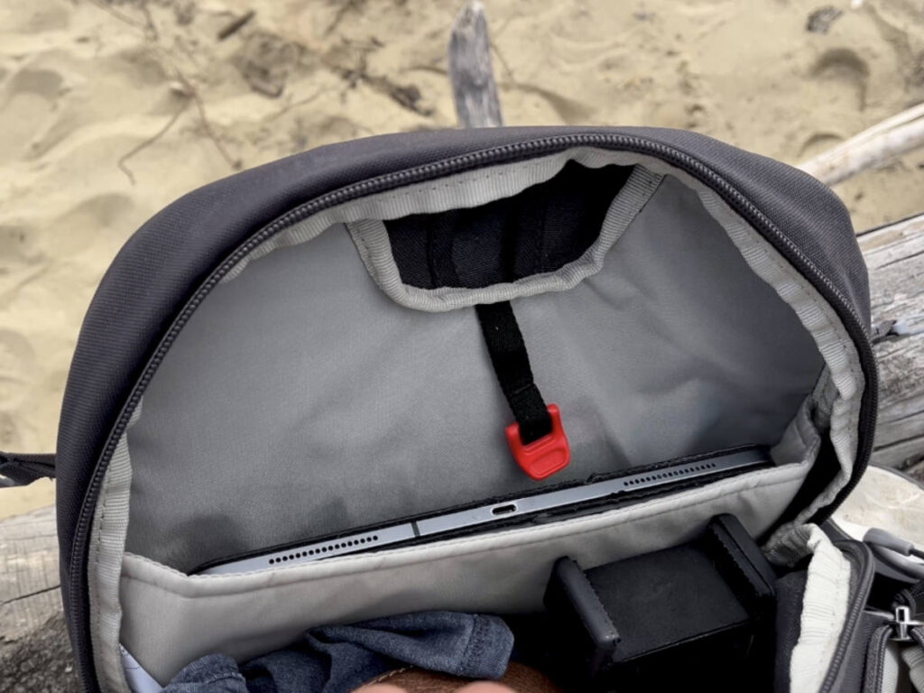 Interior view of an Osprey Daylite Plus packed with weekend travel gear and outdoor essentials.